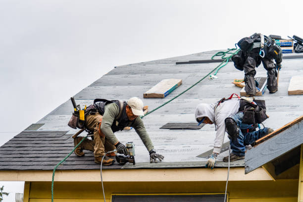 Professional Roofing technician working in Swan Lake, NY